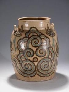 唐黃釉褐綠彩雲荷紋罐 唐黃釉褐綠彩雲荷紋罐