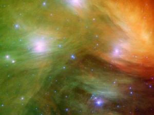 （圖）史匹哲太空望遠鏡以紅外線拍攝的昴宿星團，顯示出伴隨著的塵埃