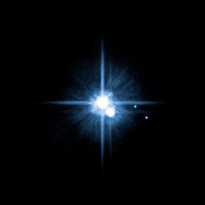 “哈勃”於2006年所拍攝的冥王星及其三顆衛星的照片。