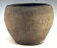 《西周原始瓷雙身龍耳罐》