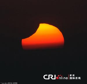 長春攝影師半夜蹲守拍攝“帶食日出”美景