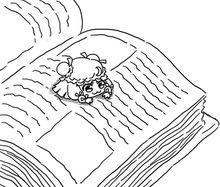 一隻帕秋莉種正在閱讀書籍