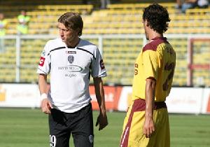 法比奧·古薩羅(左)