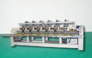 六頭珠片排版機