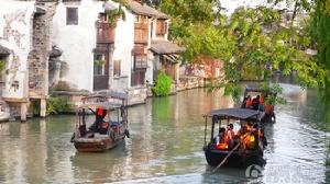 小舟載你在西市河裡悠遊