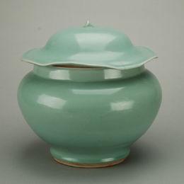 南宋龍泉窯青釉荷葉形蓋大罐 南宋龍泉窯青釉荷葉形蓋大罐