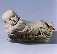 白釉孩兒枕
