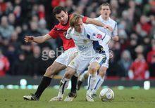 盧西亞諾&middot;貝奇奧在與曼聯的比賽中