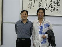 周祥林先生同高級編輯王克煜教授（左）合影