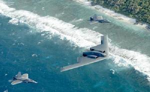 一架轟炸機與F-22戰機編隊前往安德森基地