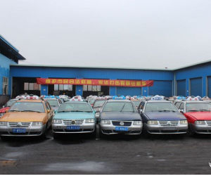 上海2014年8月10日舉行“克隆計程車”集中銷毀儀式，350輛克隆計程車在華東拆車場被集中銷毀