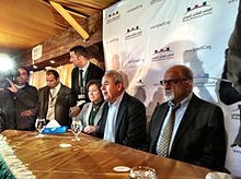 2011年12月19日，全國委員會在突尼西亞召開了第一次代表大會，圖中間的是伯翰·加利昂。