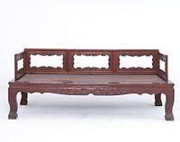 明黃花梨卷草紋藤心羅漢床 明黃花梨卷草紋藤心羅漢床