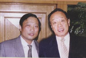 與中華人民共和國外交部部長李肇星合影。