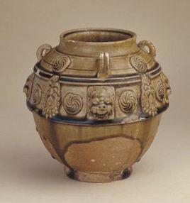 隋青釉模印塑貼四系罐 隋青釉模印塑貼四系罐