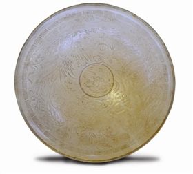 北宋定窯白釉龍鳳紋印花碗正面