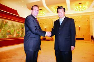 賈慶林會見蘇黎世金融服務集團執行長金世祿