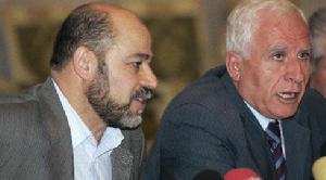 2008年3月23日，在葉門首都薩那，哈馬斯代表團團長、哈馬斯高級領導人馬爾祖克（左）和巴解組織代表團成員、法塔赫在巴立法委員會中的領袖阿扎姆·艾哈邁德在簽署宣言後召開新聞發布會。