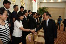 全國人大常委會副委員長韓啟德會見新理事