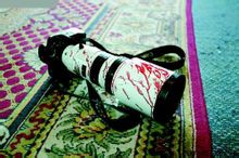 攝影記者帶血的相機