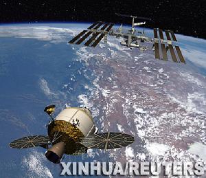 這張電腦製作的效果圖顯示一艘太空飛行器（左）正在靠近國際空間站