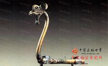 西漢鎏金龍首形蓋弓帽