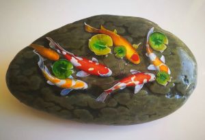 錦鯉輕戲蓮葉間