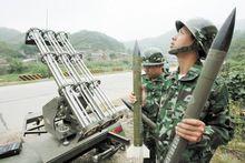 湖南寧鄉縣炮手正準備實施人工降雨