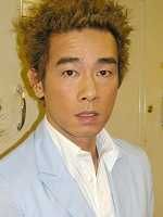 陳小春飾游志標