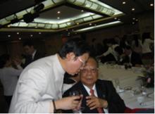 劉建吉先生和金利來集團主席曾憲梓先生