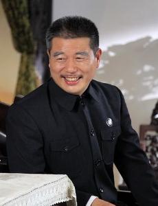 周惠林片中造型