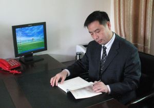 唐再良[早起評話演員]