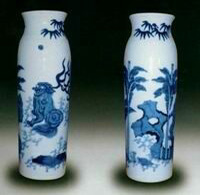 清順治青花洞石瑞獸直筒瓶