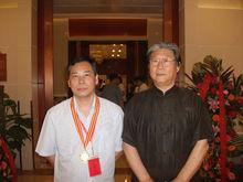 黃昌友（左）和中國美術館副館長楊炳延合影