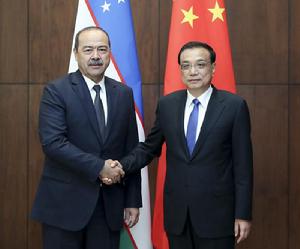 李克強在杜尚別會見阿里波夫20181012