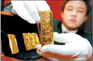 中國印鈔造幣總公司展示“北京奧運金”金條