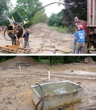 安裝人員向下鑽出100英尺深數英尺寬的洞