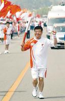 韓召善擔任火炬手