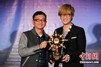 陳信榮與周傳雄