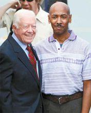 統吉米&middot;卡特和艾賈龍&middot;馬利&middot;戈梅斯(右)