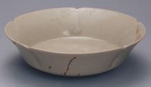 唐越窯青瓷花式盤 唐越窯青瓷花式盤