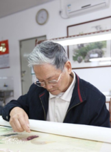 廣繡大師許熾光