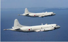 飛越禮樂灘的日本P-3C反潛偵察機
