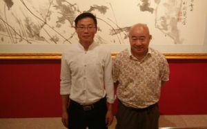 與中國書畫院國畫院院長范揚合影