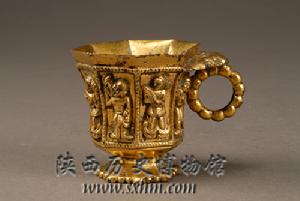 唐伎樂紋八棱金杯 唐伎樂紋八棱金杯