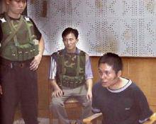 張君[渝湘鄂系列持槍搶劫殺人案首犯]