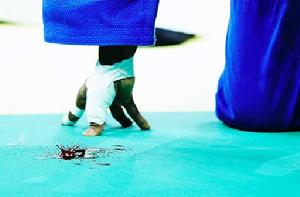 荷賽獎體育類單圖金獎作品《血染賽場》：柔道選手巴普蒂斯塔在奧運會的比賽中