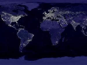 這是一張人工合成照片，照片上燈光照明不均也反映出世界經濟發展不平衡