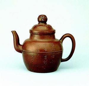 弦紋金錢如意壺