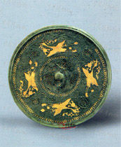 唐金銀平脫變鳥銜綬鏡